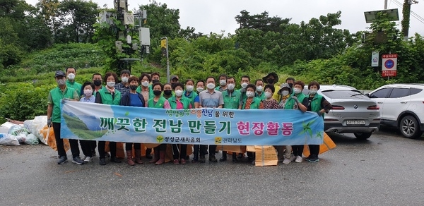 장성군 북이면 새마을회, 장성호 수변길 환경정화 나서 이미지 1