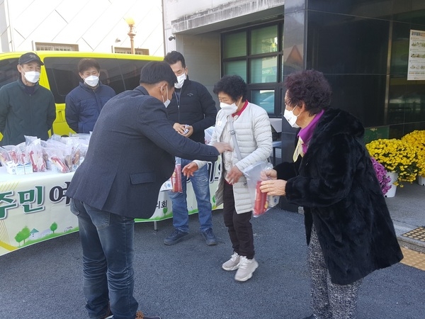 장성군 북하면 이장협의회, 백신 추가접종자 간식 전달 이미지 1